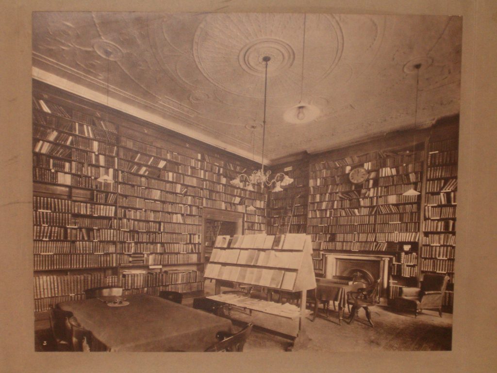 1880s Reading Room with periodical rack and fireplace